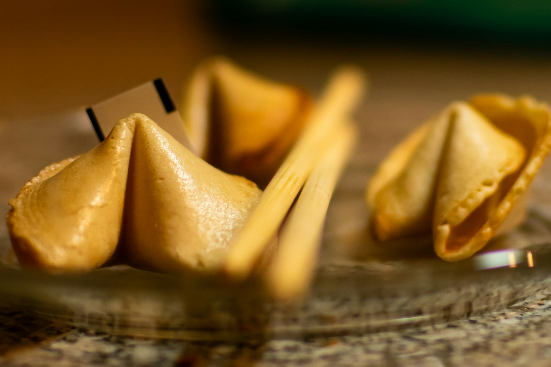 Fortune cookies on a plate.  Image by Tuccera LLC on Unsplash